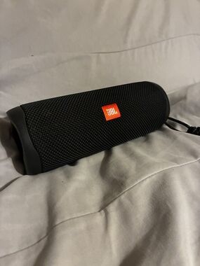 JBL Black Portable Bluetooth Speaker with Orange Logo